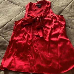 White House Black Market Red 100% silk top with beautiful tie-front detailing